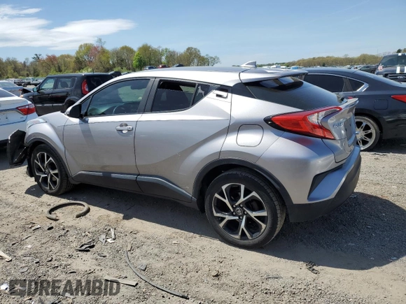 2018 Toyota C-HR XLE z VIN NMTKHMBX8JR001011, wystawiony jako Copart lot #55469265 z przebiegiem 106 938 mil mil oraz Szkoda całkowita • Salvage title. Historia ofert i sprzedaży dostępna na DreamBid. Obrazek 2.