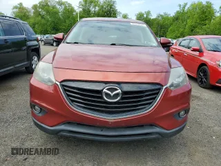 2013 Mazda CX-9 Grand Touring z VIN JM3TB3DV0D0409448, wystawiony jako Copart lot #57339435 z przebiegiem 146 366 mil mil oraz Czysty tytuł • Clean title. Historia ofert i sprzedaży dostępna na DreamBid. Obrazek 5.