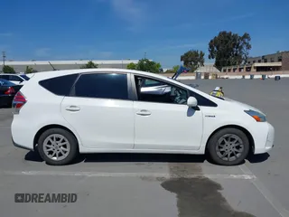 2016 Toyota Prius v Two with VIN JTDZN3EU5GJ051939, listed as a IAAI auction lot 42162040 with 275,213 mi miles. Bid and sale history available at carsss.com. Image 13.