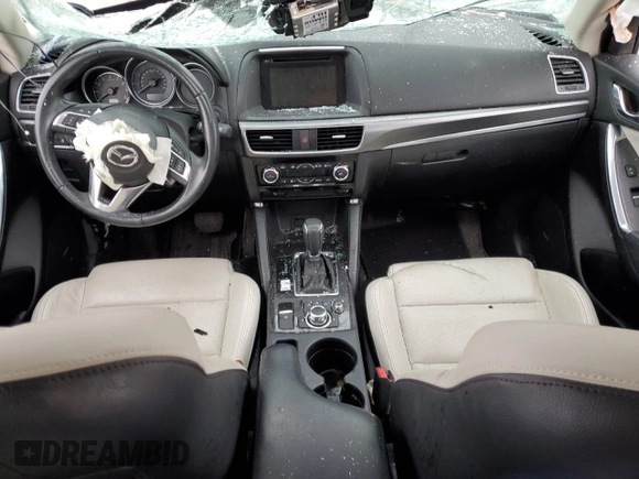 2016 Mazda CX-5 Grand Touring with VIN JM3KE4DY3G0797301, listed as a Copart auction lot 88356205 with Not Provided miles and Non Repairable. Bid and sale history available at carsss.com. Image 8.