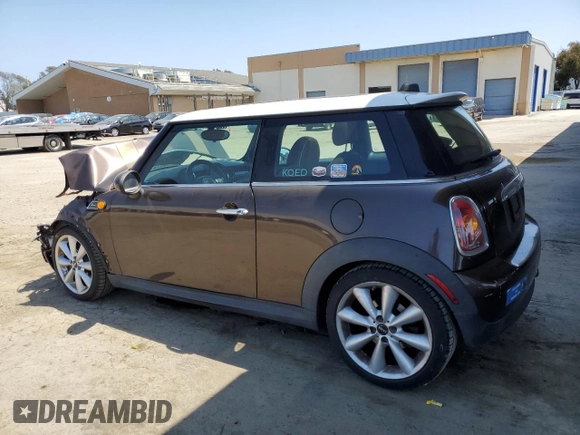2010 MINI Hardtop with VIN WMWMF3C52ATZ62824, listed as a Copart auction lot 55175395 with 110,585 mi miles and Salvage Title. Bid and sale history available at DreamBid. Image 2.