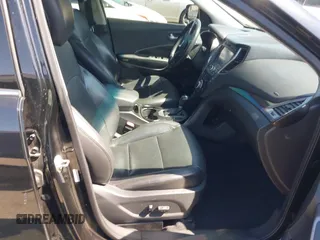 2013 Hyundai Santa Fe Sport z VIN 5XYZW3LA8DG037065, wystawiony jako IAAI lot #42139488 z przebiegiem 165 794 mil mil oraz . Historia ofert i sprzedaży dostępna na DreamBid. Obrazek 5.