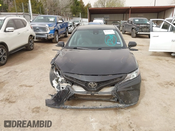2019 Toyota Camry LE z VIN 4T1B11HK6KU805252, wystawiony jako IAAI lot #41787833 z przebiegiem 85 196 mil mil oraz . Historia ofert i sprzedaży dostępna na DreamBid. Obrazek 13.