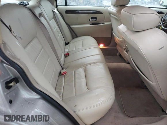 2000 Lincoln Town Car Signature with VIN 1LNHM82W2YY770068, listed as a Copart auction lot 44062385 with 109,941 mi miles and Salvage title. Bid and sale history available at DreamBid. Image 11.