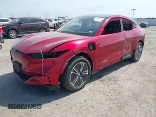 2023 Ford Mustang Mach-E Premium z VIN 3FMTK3R40PMA88565, wystawiony jako IAAI lot #42245792 z przebiegiem 21 394 mil mil oraz . Historia ofert i sprzedaży dostępna na DreamBid. Obrazek 21.