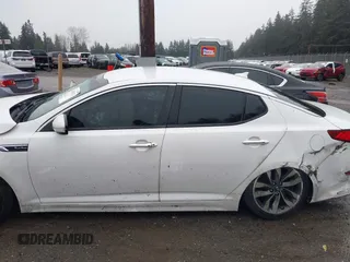 2015 Kia Optima SXL Turbo z VIN 5XXGR4A66FG510911, wystawiony jako IAAI lot #41855352 z przebiegiem 150 576 mil mil oraz . Historia ofert i sprzedaży dostępna na DreamBid. Obrazek 13.