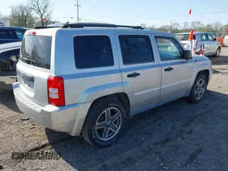 2009 Jeep Patriot Sport z VIN 1J4FT28B29D110728, wystawiony jako IAAI lot #41932676 z przebiegiem 194 442 mil mil oraz . Historia ofert i sprzedaży dostępna na DreamBid. Obrazek 4.