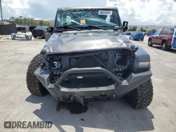 2019 Jeep Wrangler Sport S with VIN 1C4GJXAG4KW569059, listed as a Copart auction lot 60546945 with 57,131 mi miles and Non repairable. Bid and sale history available at DreamBid. Image 5.