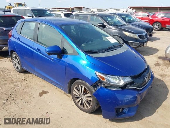 2015 Honda Fit EX-L z VIN 3HGGK5H89FM761083, wystawiony jako IAAI lot #42403123 z przebiegiem 132 543 mil mil oraz . Historia ofert i sprzedaży dostępna na DreamBid. Obrazek 1.