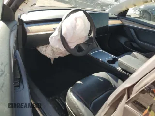 2023 Tesla Model 3 z VIN 5YJ3E1EA5PF401240, wystawiony jako Copart lot #56548895 z przebiegiem 25 188 mil mil oraz Szkoda całkowita • Salvage title. Historia ofert i sprzedaży dostępna na DreamBid. Obrazek 8.