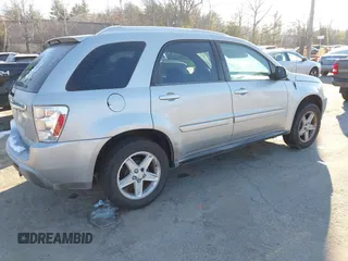 2005 Chevrolet Equinox LT with VIN 2CNDL73F856018239, listed as a IAAI auction lot 41371313 with 90,799 mi miles. Bid and sale history available at carsss.com. Image 4.