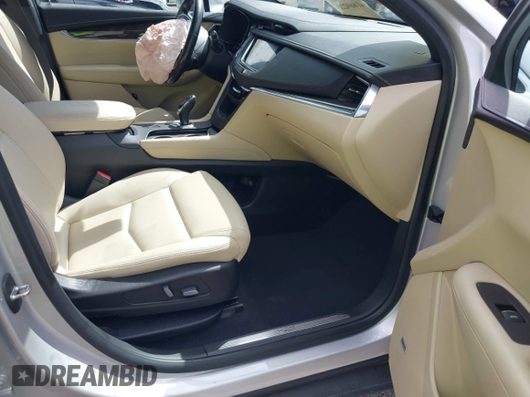 2019 Cadillac XT5 FWD z VIN 1GYKNARSXKZ242727, wystawiony jako IAAI lot #41669220 z przebiegiem 62 812 mil mil oraz . Historia ofert i sprzedaży dostępna na DreamBid. Obrazek 5.