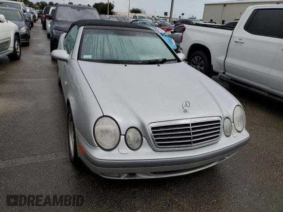 1999 Mercedes-Benz CLK 320/430 z VIN WDBLK65GXXT023566, wystawiony jako Copart lot #73857834 z przebiegiem Nie podano mil oraz Szkoda całkowita • Salvage title. Historia ofert i sprzedaży dostępna na DreamBid. Obrazek 5.