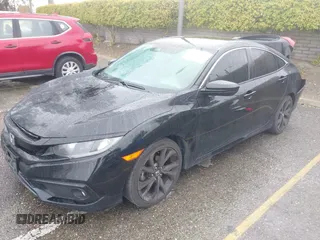 2020 Honda Civic Sedan Sport with VIN 19XFC2F85LE211765, listed as a IAAI auction lot 41765233 with 77,751 mi miles. Bid and sale history available at carsss.com. Image 2.