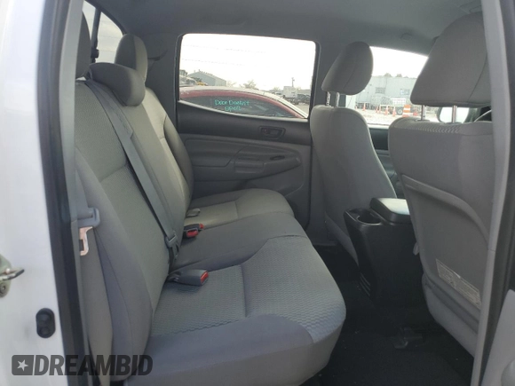 2014 Toyota Tacoma PreRunner with VIN 3TMKU4HN7EM040312, listed as a Copart auction lot 87420864 with 68,853 mi miles and Salvage title. Bid and sale history available at DreamBid. Image 10.