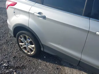 2013 Ford Escape SEL z VIN 1FMCU9HX8DUC26143, wystawiony jako IAAI lot #42815698 z przebiegiem 255 242 mil mil oraz . Historia ofert i sprzedaży dostępna na DreamBid. Obrazek 6.