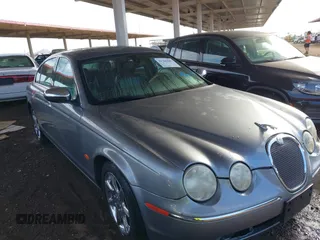 2007 Jaguar S-Type 3.0 with VIN SAJWA01A47FN75550, listed as a IAAI auction lot 41765587 with 153,072 mi miles. Bid and sale history available at carsss.com. Image 1.