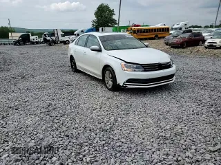 2015 Volkswagen Jetta SE with VIN 3VWD17AJ4FM308693, listed as a Copart auction lot 59987585 with 87,136 mi miles and Salvage title. Bid and sale history available at DreamBid. Image 14.