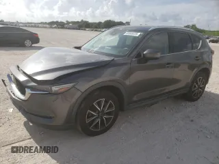 2018 Mazda CX-5 Grand Touring с VIN JM3KFADM8J1350960, выставлен на аукционе Copart как лот 60068535 с пробегом 44 454 миль миль и Списание • Salvage title. История ставок и продаж доступна на DreamBid. Изображение 1.