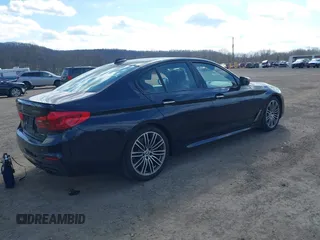 2018 BMW 5 Series M550i xDrive with VIN WBAJB9C52JB035930, listed as a IAAI auction lot 41674415 with 56,294 mi miles and . Bid and sale history available at DreamBid. Image 4.
