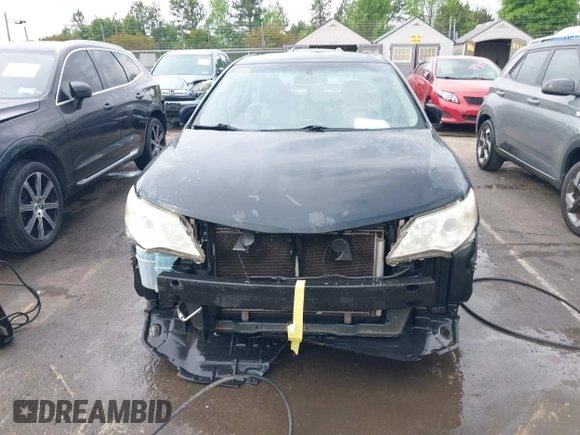 2012 Toyota Camry L with VIN 4T1BF1FK0CU029447, listed as a IAAI auction lot 42034020 with 270,013 mi miles. Bid and sale history available at carsss.com. Image 6.