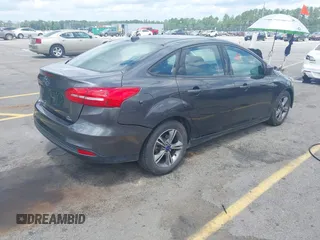 2018 Ford Focus SE with VIN 1FADP3FE2JL263954, listed as a IAAI auction lot 42480748 with 111,059 mi miles and . Bid and sale history available at DreamBid. Image 4.