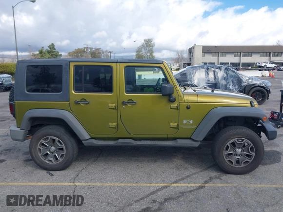 2007 Jeep Wrangler Unlimited X with VIN 1J8GB39107L114510, listed as a IAAI auction lot 41736367 with 467,567 mi miles and . Bid and sale history available at DreamBid. Image 13.