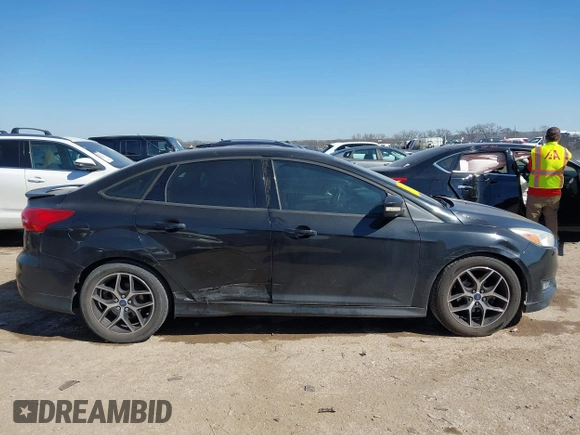 2015 Ford Focus SE with VIN 1FADP3F24FL313640, listed as a IAAI auction lot 41651845 with 146,390 mi miles. Bid and sale history available at carsss.com. Image 14.