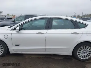 2015 Ford Fusion Energi SE Luxury with VIN 3FA6P0PU7FR284076, listed as a IAAI auction lot 41922445 with 101,276 mi miles. Bid and sale history available at carsss.com. Image 14.