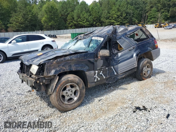 1996 Jeep Grand Cherokee Laredo with VIN 1J4FX58S6TC349590, listed as a Copart auction lot 72278714 with 0 mi miles and Salvage Title. Bid and sale history available at carsss.com. Image 1.
