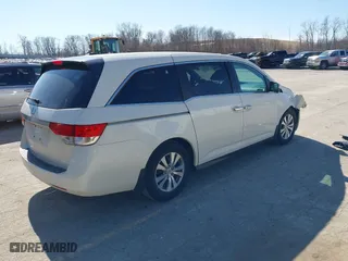 2016 Honda Odyssey EX-L with VIN 5FNRL5H69GB088577, listed as a IAAI auction lot 41768752 with 157,058 mi miles. Bid and sale history available at carsss.com. Image 4.