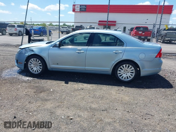 2010 Ford Fusion Hybrid z VIN 3FADP0L33AR385001, wystawiony jako IAAI lot #42074965 z przebiegiem 195 962 mil mil oraz . Historia ofert i sprzedaży dostępna na DreamBid. Obrazek 14.