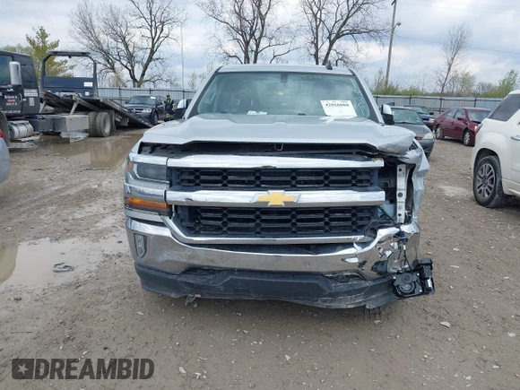 2018 Chevrolet Silverado 1500 LT with VIN 1GCVKREH9JZ119861, listed as a IAAI auction lot 42016088 with 91,176 mi miles and . Bid and sale history available at DreamBid. Image 6.