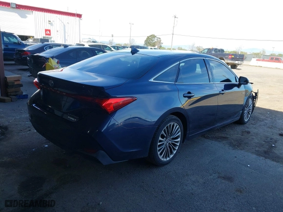 2019 Toyota Avalon Hybrid Limited with VIN 4T1B21FB5KU007633, listed as a IAAI auction lot 41615161 with 132,182 mi miles. Bid and sale history available at carsss.com. Image 4.