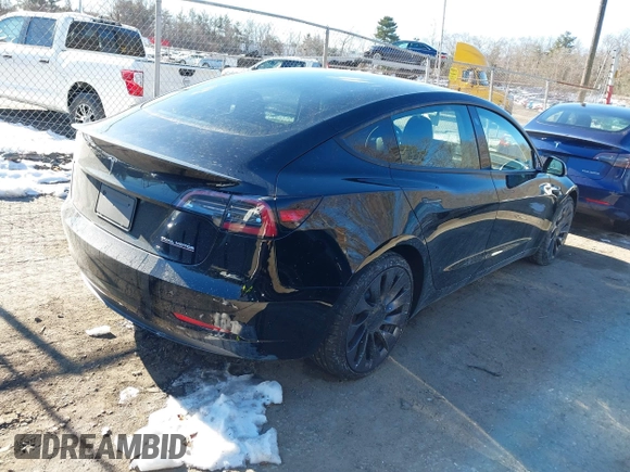 2021 Tesla Model 3 Performance with VIN 5YJ3E1EC5MF090518, listed as a IAAI auction lot 38775658 with 14,118 mi miles and . Bid and sale history available at carsss.com. Image 4.