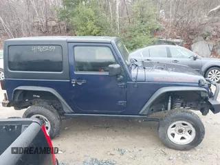 2013 Jeep Wrangler Rubicon 10th Anniversary with VIN 1C4BJWCG7DL544145, listed as a IAAI auction lot 41965259 with 125,900 mi miles and . Bid and sale history available at carsss.com. Image 14.