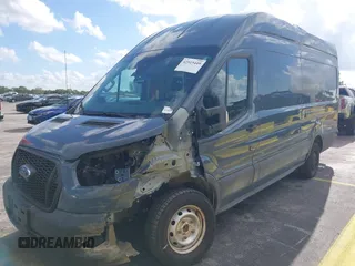 2021 Ford Transit Cargo with VIN 1FTBR3X89MKA54791, listed as a IAAI auction lot 42515449 with 57,847 mi miles and . Bid and sale history available at DreamBid. Image 2.