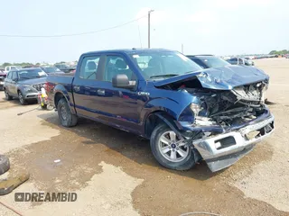 2018 Ford F-150 XL with VIN 1FTEW1CB2JKE36068, listed as a IAAI auction lot 42311204 with 107,596 mi miles and . Bid and sale history available at DreamBid. Image 1.