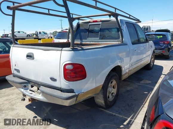 2001 Ford F-150 XLT with VIN 1FTRW07W21KE19926, listed as a IAAI auction lot 42750523 with Not provided miles and . Bid and sale history available at DreamBid. Image 4.