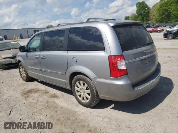 2013 Chrysler Town & Country Touring with VIN 2C4RC1BG7DR778001, listed as a Copart auction lot 51655184 with 181,861 mi miles and Salvage Title. Bid and sale history available at DreamBid. Image 2.