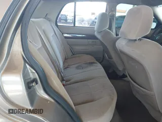 2004 Mercury Grand Marquis GS z VIN 2MEFM74W44X661154, wystawiony jako IAAI lot #42268675 z przebiegiem 236 456 mil mil oraz . Historia ofert i sprzedaży dostępna na DreamBid. Obrazek 8.