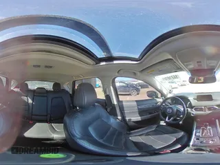 2019 Mazda CX-5 Grand Touring with VIN JM3KFADM6K0543888, listed as a Copart auction lot 56310785 with 112,737 mi miles and Salvage title. Bid and sale history available at DreamBid. Image 16.