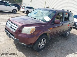 2007 Honda Pilot EX-L with VIN 5FNYF28517B002591, listed as a IAAI auction lot 41760295 with 204,533 mi miles. Bid and sale history available at carsss.com. Image 2.