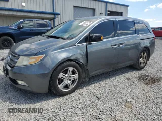 2011 Honda Odyssey Touring с VIN 5FNRL5H95BB047088, выставлен на аукционе Copart как лот 58379295 с пробегом 267 580 миль миль и Списание • Salvage title. История ставок и продаж доступна на DreamBid. Изображение 1.