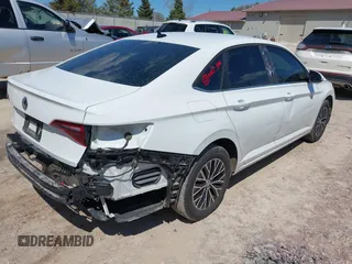 2021 Volkswagen Jetta S z VIN 3VWC57BU6MM045659, wystawiony jako IAAI lot #42201090 z przebiegiem 66 937 mil mil oraz . Historia ofert i sprzedaży dostępna na DreamBid. Obrazek 4.
