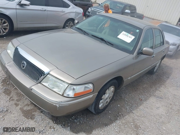2005 Mercury Grand Marquis LS Premium with VIN 2MEFM75W35X654244, listed as a IAAI auction lot 42090783 with 120,033 mi miles. Bid and sale history available at carsss.com. Image 2.