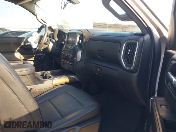 2021 Chevrolet Silverado 1500 RST with VIN 1GCUYEED3MZ112490, listed as a IAAI auction lot 41970233 with 65,509 mi miles and . Bid and sale history available at DreamBid. Image 5.