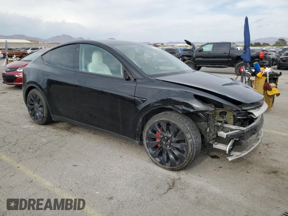 2022 Tesla Model Y Performance with VIN 7SAYGDEF1NF407985, listed as a Copart auction lot 53831325 with 41,225 mi miles and Salvage title. Bid and sale history available at DreamBid. Image 4.