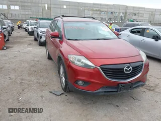 2015 Mazda CX-9 Grand Touring with VIN JM3TB2DA6F0460785, listed as a IAAI auction lot 42474705 with 62,202 mi miles and . Bid and sale history available at DreamBid. Image 1.