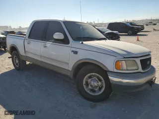 2001 Ford F-150 SuperCrew XLT with VIN 1FTRW07L21KB29790, listed as a Copart auction lot 76416684 with 221,631 mi miles and Salvage Title. Bid and sale history available at carsss.com. Image 4.